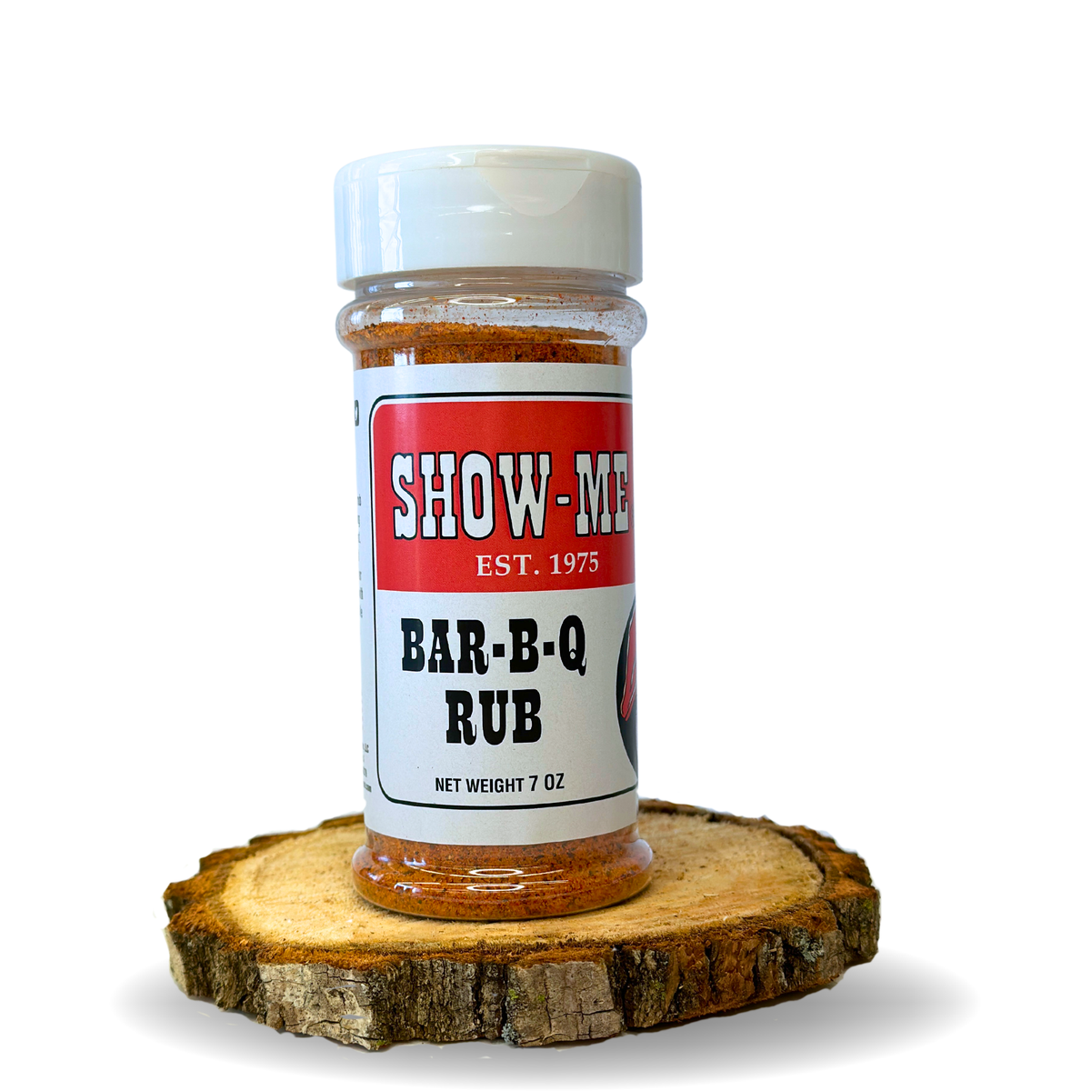 Show-Me® Bar-B-Q Rub 7 oz shaker on a wood round