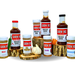 Show-Me® BBQ gift set lineup: Classic, 'Some Heat' and Habanero sauces with five seasoning shakers on wood rounds